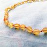 02 colar de ambar oval bebe