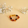 09 pulseira de ambar oval bebe